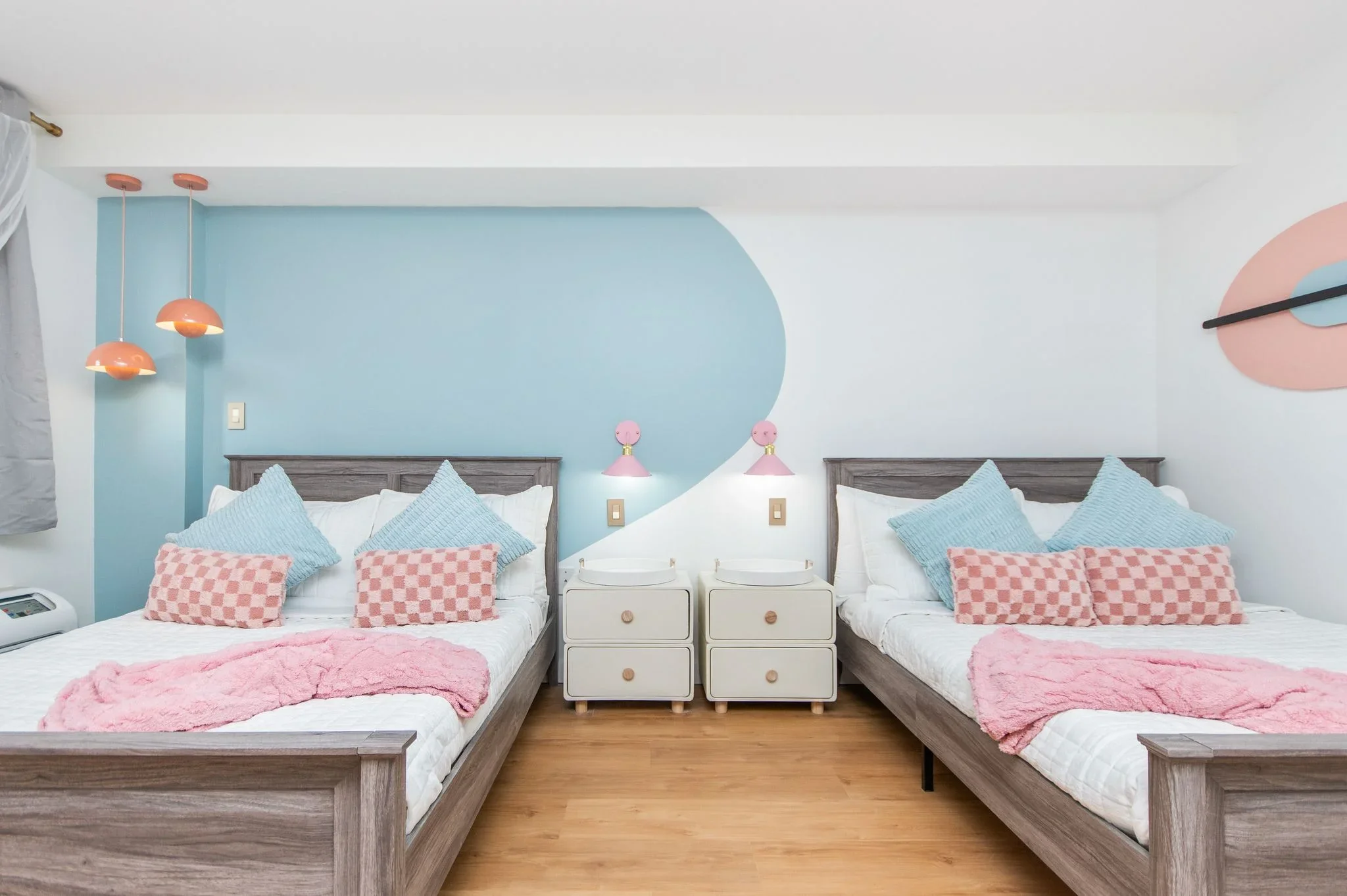 Custom geometric accent wall painting in Myrtle Beach SC — blue curved accent wall with decorative finish by Apex Painting